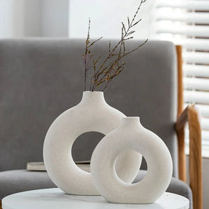 Nordic Circular Hollow Ceramic Vase, featuring a minimalist design perfect for modern home decor.